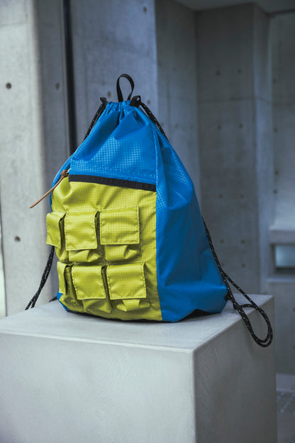 PARASITE KNAPSAC -BLUE×GREEN-